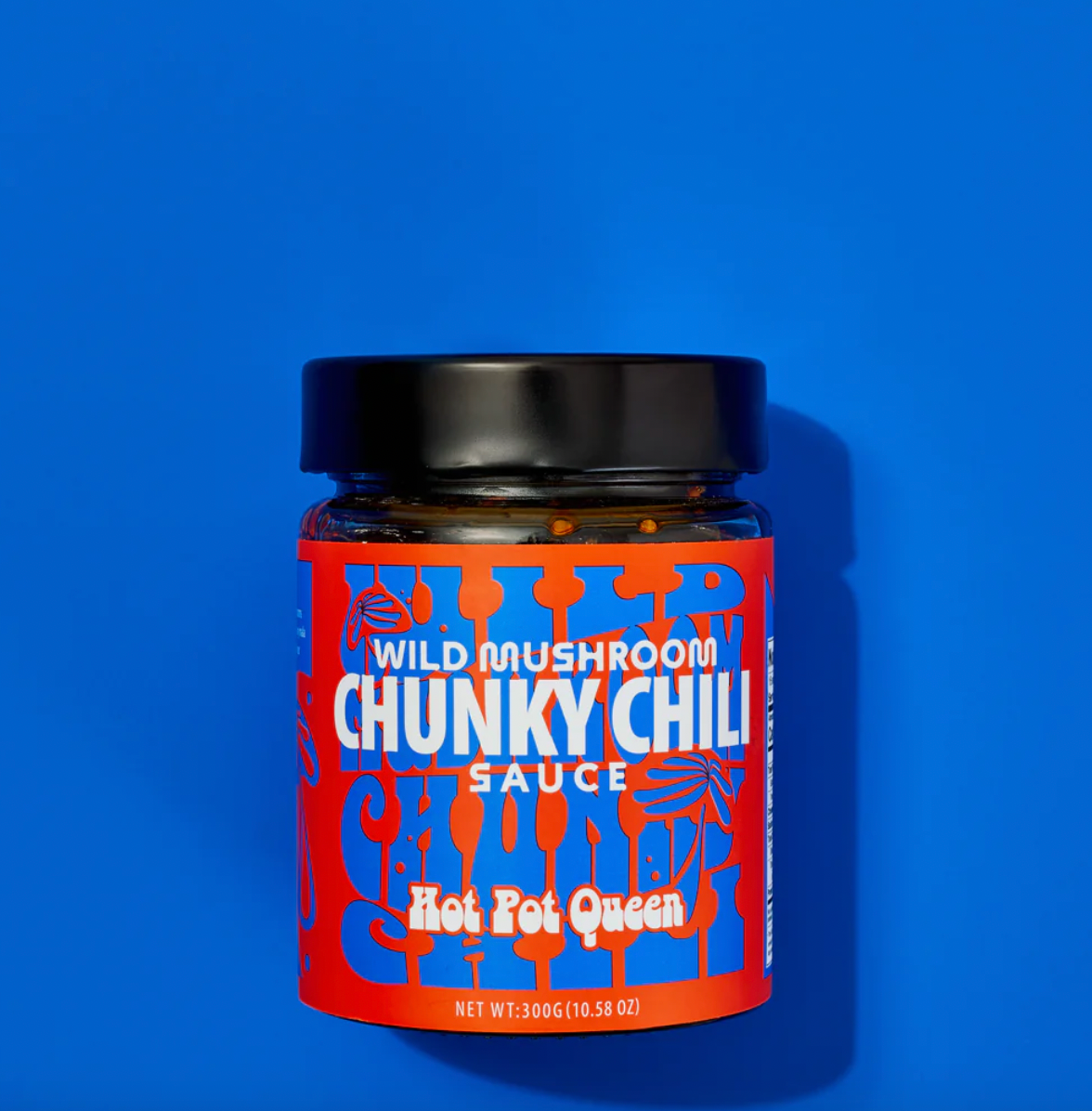 Close up of wild mushroom chili sauce with blue background